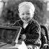 Boy in toy car